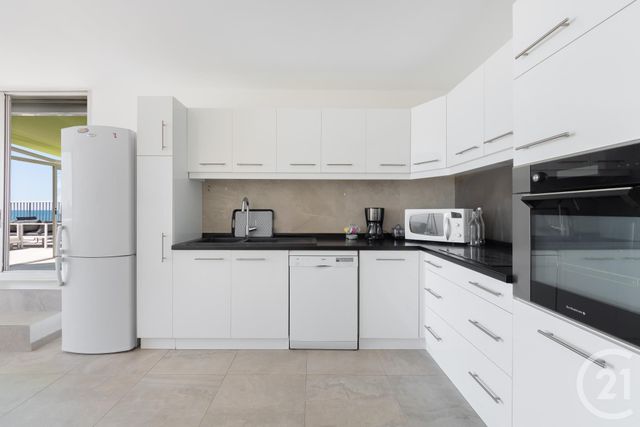 Afficher la photo en grand Appartement T4 à louer - 4 pièces - 100.0 m2 - LA GRANDE MOTTE - 34 - LANGUEDOC-ROUSSILLON - Century 21 Rouvière Immobilier
