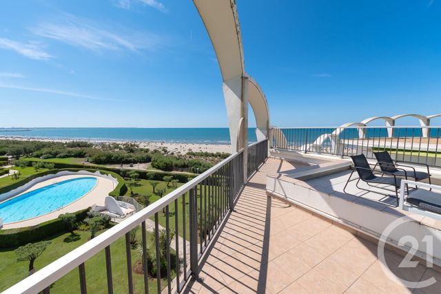 Afficher la photo en grand Appartement T4 à louer - 4 pièces - 100.0 m2 - LA GRANDE MOTTE - 34 - LANGUEDOC-ROUSSILLON - Century 21 Rouvière Immobilier