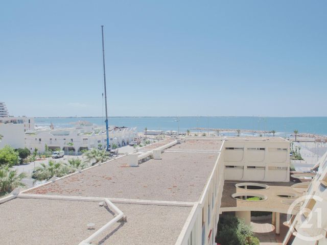 Afficher la photo en grand Studio à louer - 1 pièce - 20.0 m2 - LA GRANDE MOTTE - 34 - LANGUEDOC-ROUSSILLON - Century 21 Rouvière Immobilier