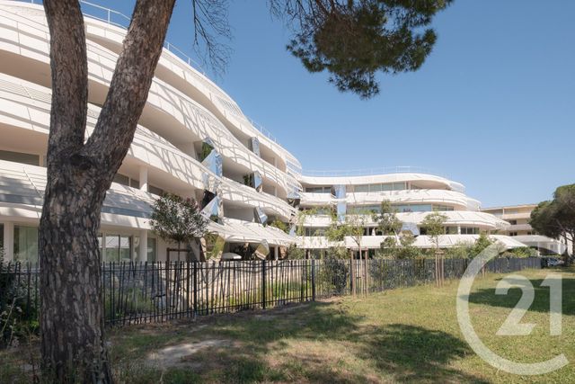Appartement T4 à vendre - 4 pièces - 100.25 m2 - LA GRANDE MOTTE - 34 - LANGUEDOC-ROUSSILLON - Century 21 Rouvière Immobilier