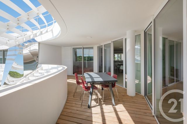 Appartement T4 à vendre - 4 pièces - 100.25 m2 - LA GRANDE MOTTE - 34 - LANGUEDOC-ROUSSILLON - Century 21 Rouvière Immobilier